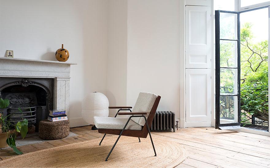  Chevron armchair by Robin Day with Hotaru double bubble table lamp from twentytwentyone